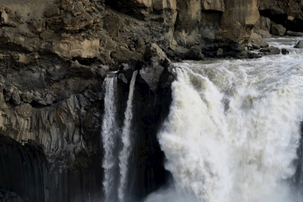 a waterfall in a rocky place