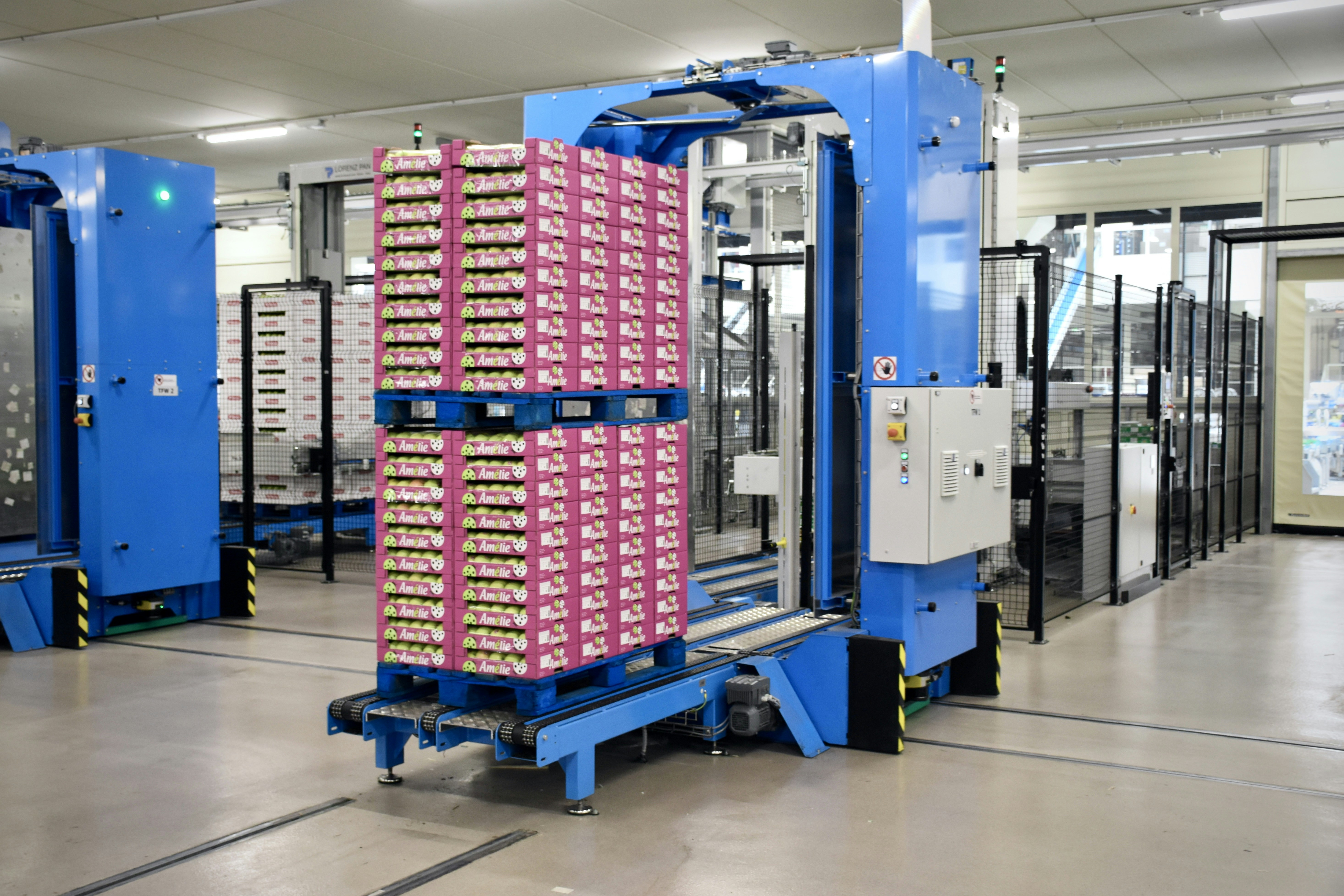 automated warehouse battery charging station with industrial robot arms
