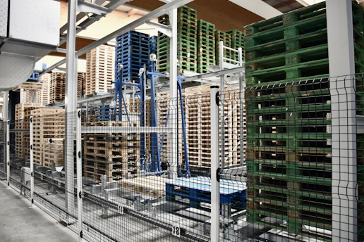 A truck loaded with wooden pallets ready for recycling in a Texas warehouse.