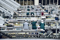 a group of people in a factory