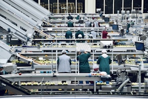 a group of people in a factory