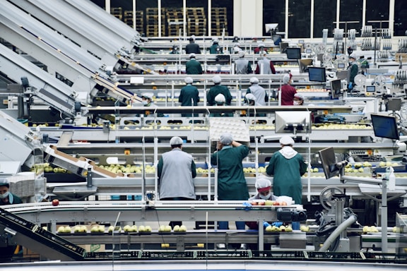a group of people in a factory