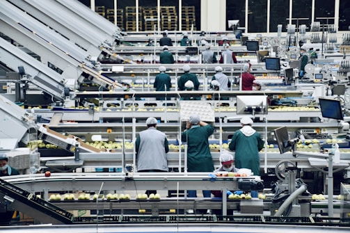 a group of people in a factory