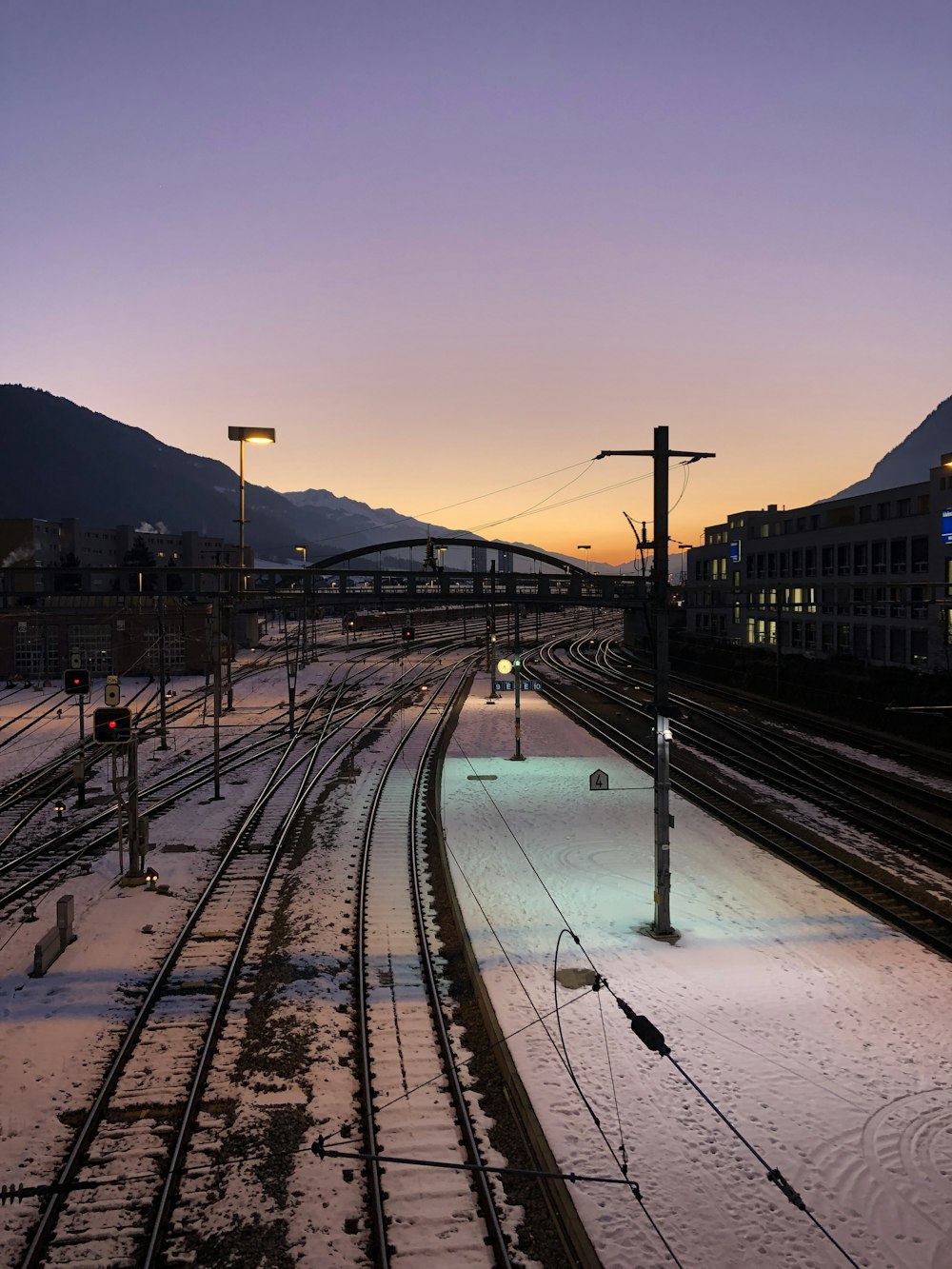 a train track with snow on it