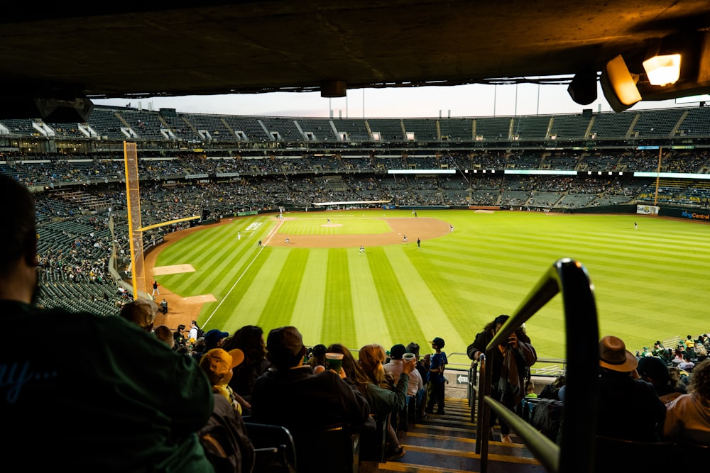 a football stadium with people in the stands