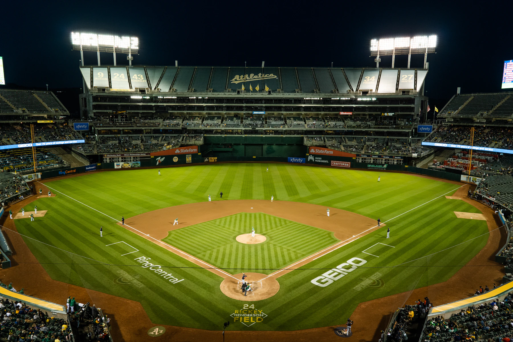 A baseball stadium with a full crowd
