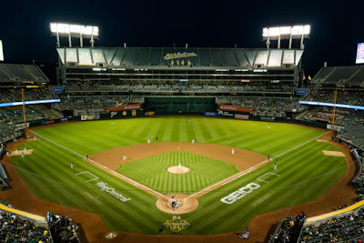 A baseball stadium with a full crowd