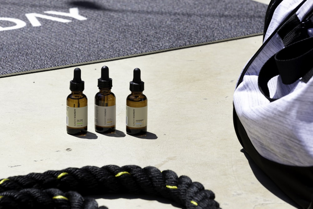 a group of bottles on the ground