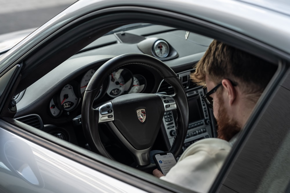 a man driving a car