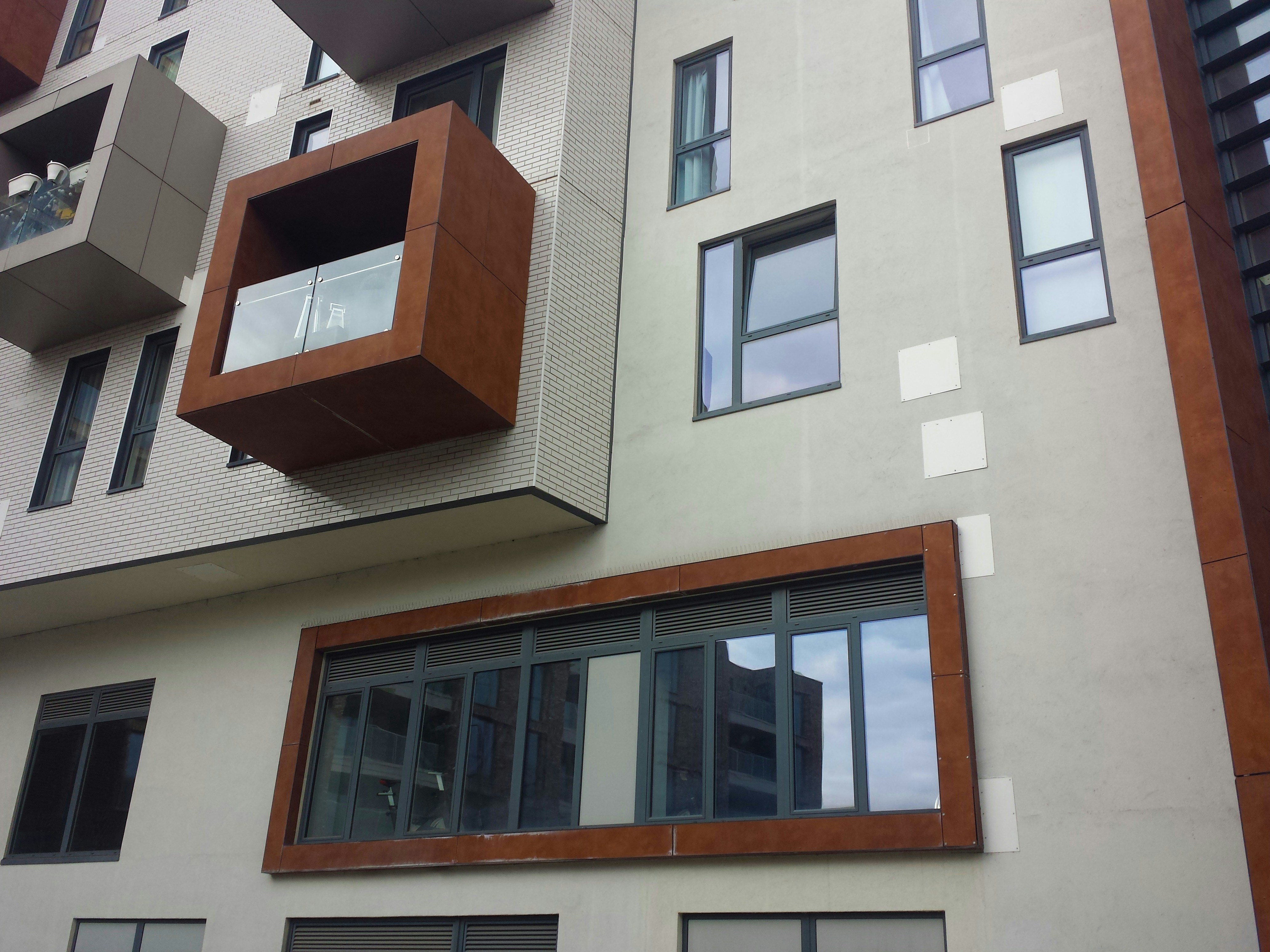 Modern senior living apartment exterior with walking paths - independent senior living