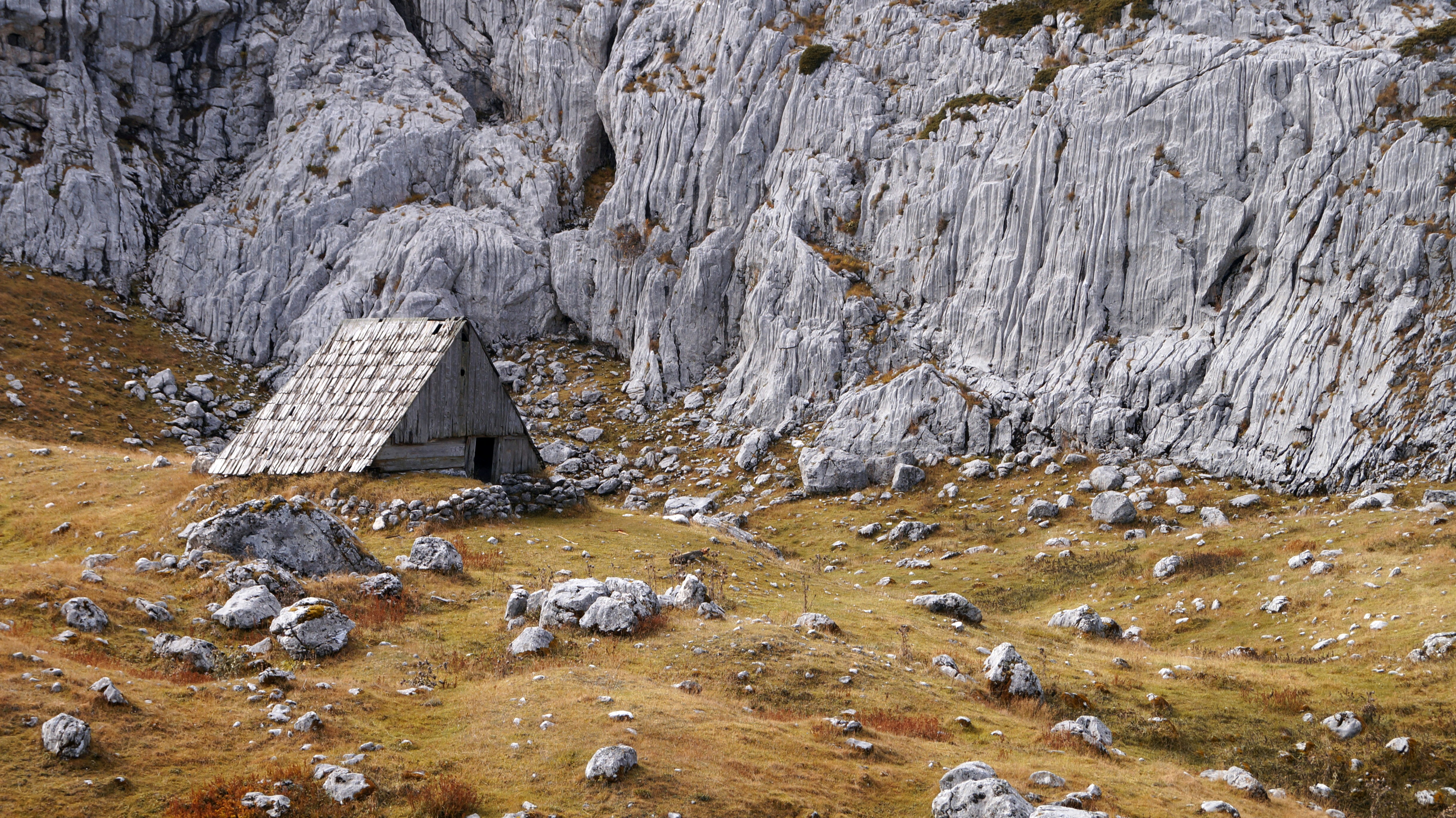 a building in a rocky area