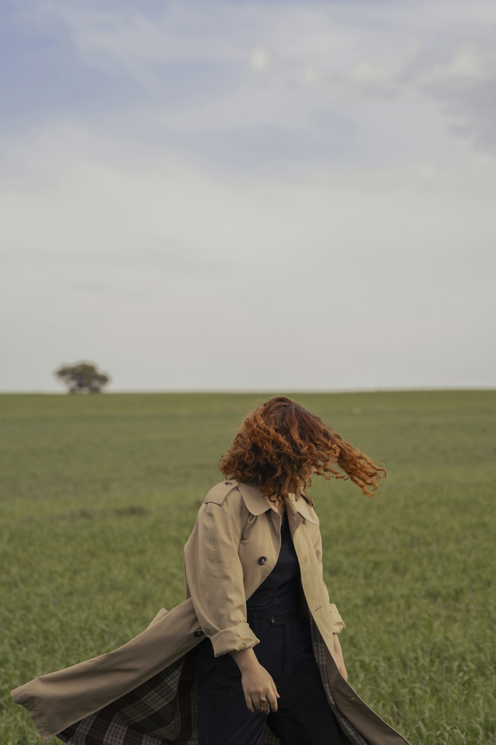 a person sitting in a field