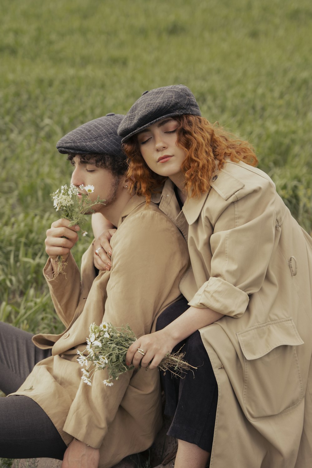 a man and woman in a field