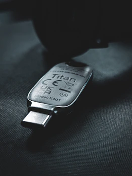 An image of a USB token device used for e-CPF security with a business background.