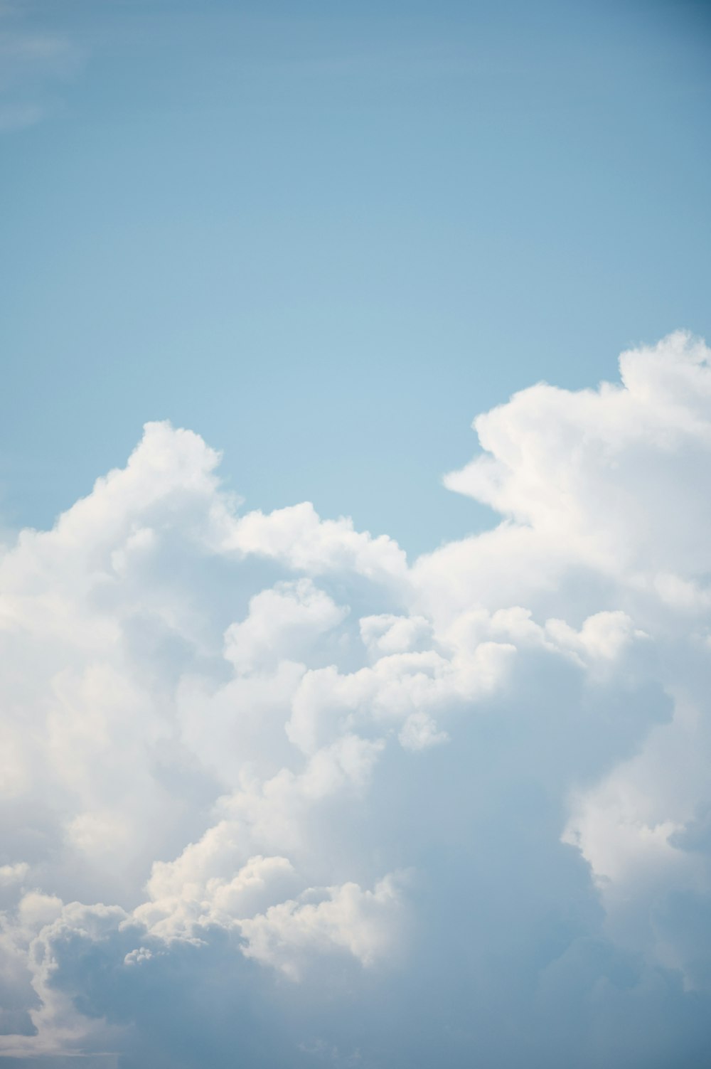 a blue sky with white clouds