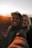 a man and woman taking a selfie