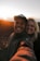 a man and woman taking a selfie