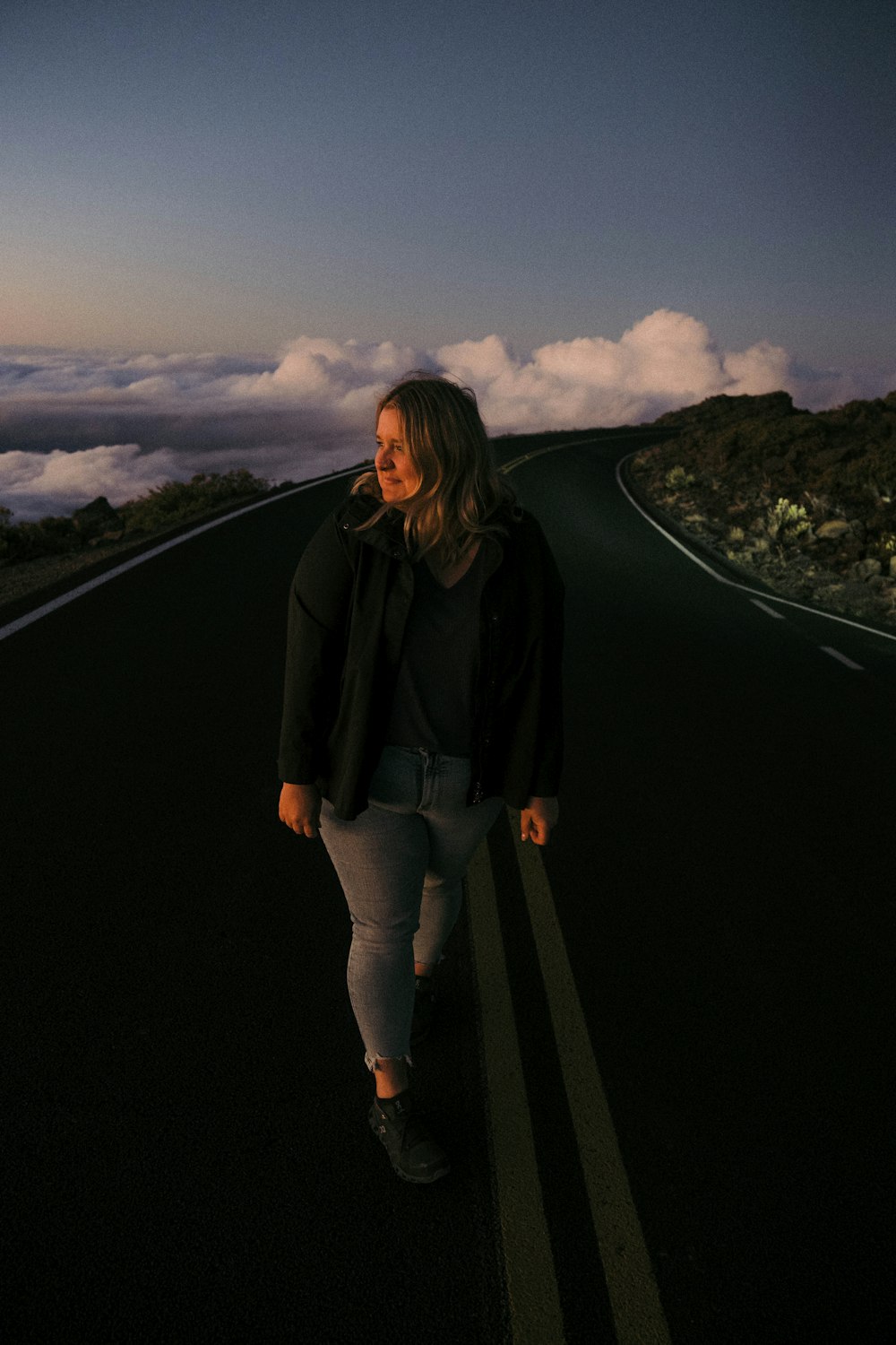 a man standing on a road