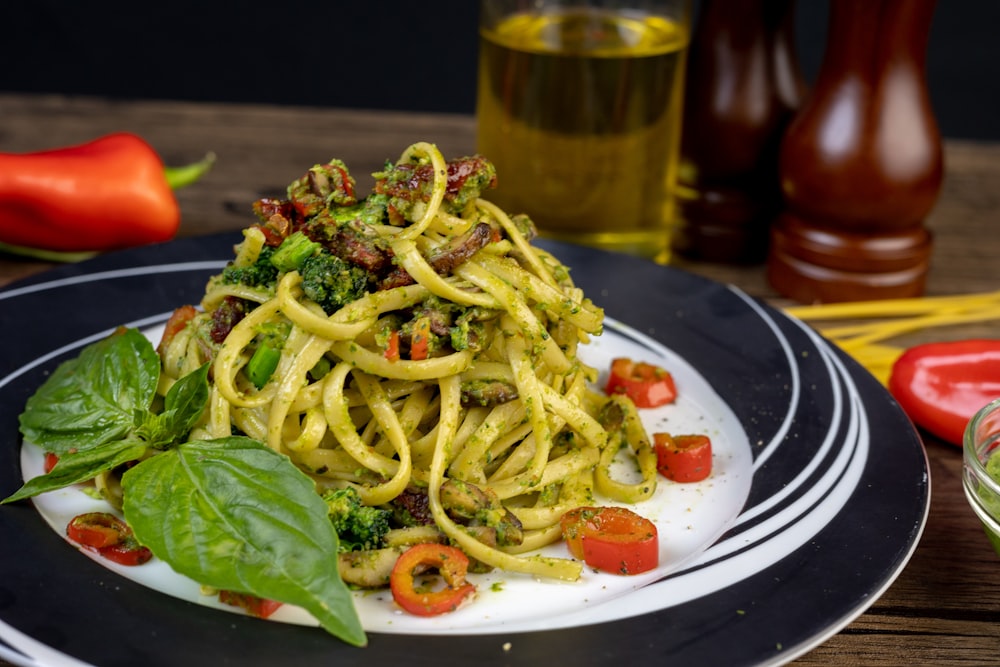 a plate of pasta and vegetables