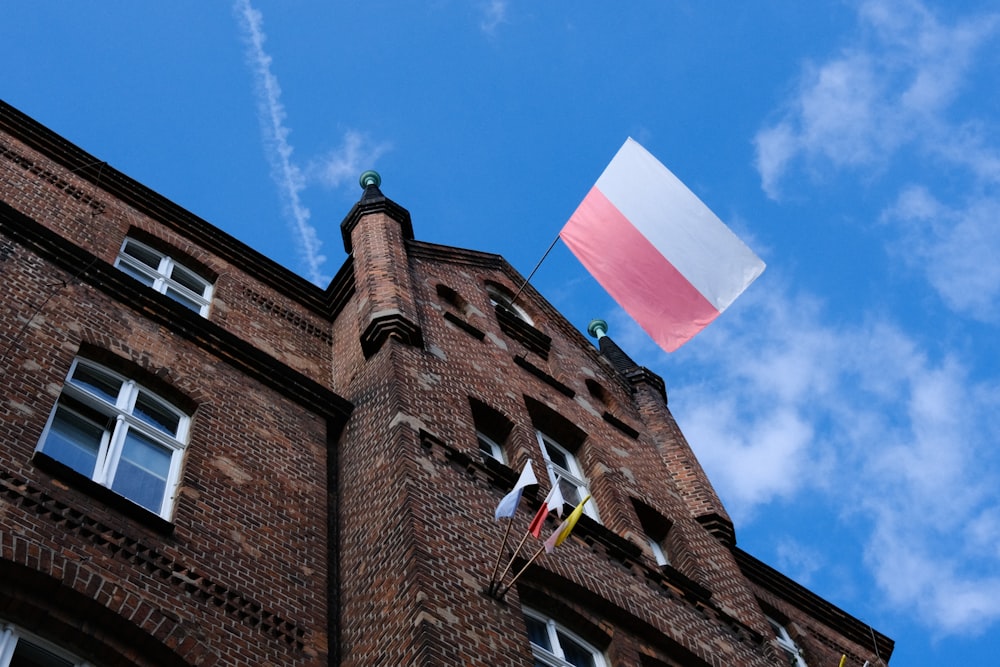 a flag flying on a building
