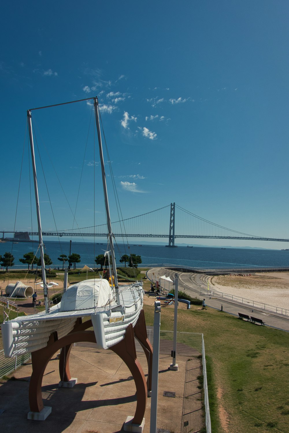 a metal structure on a beach