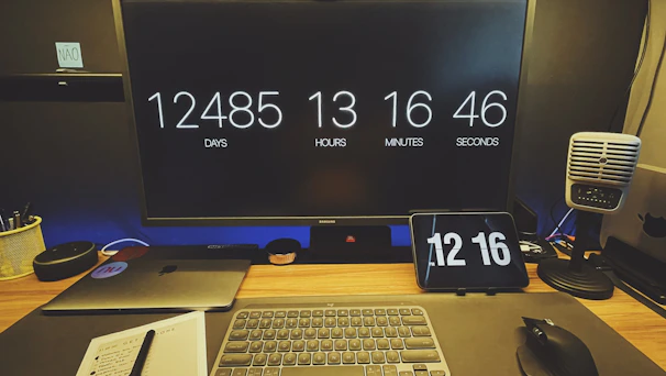 A countdown timer on a laptop screen signaling website launch day.