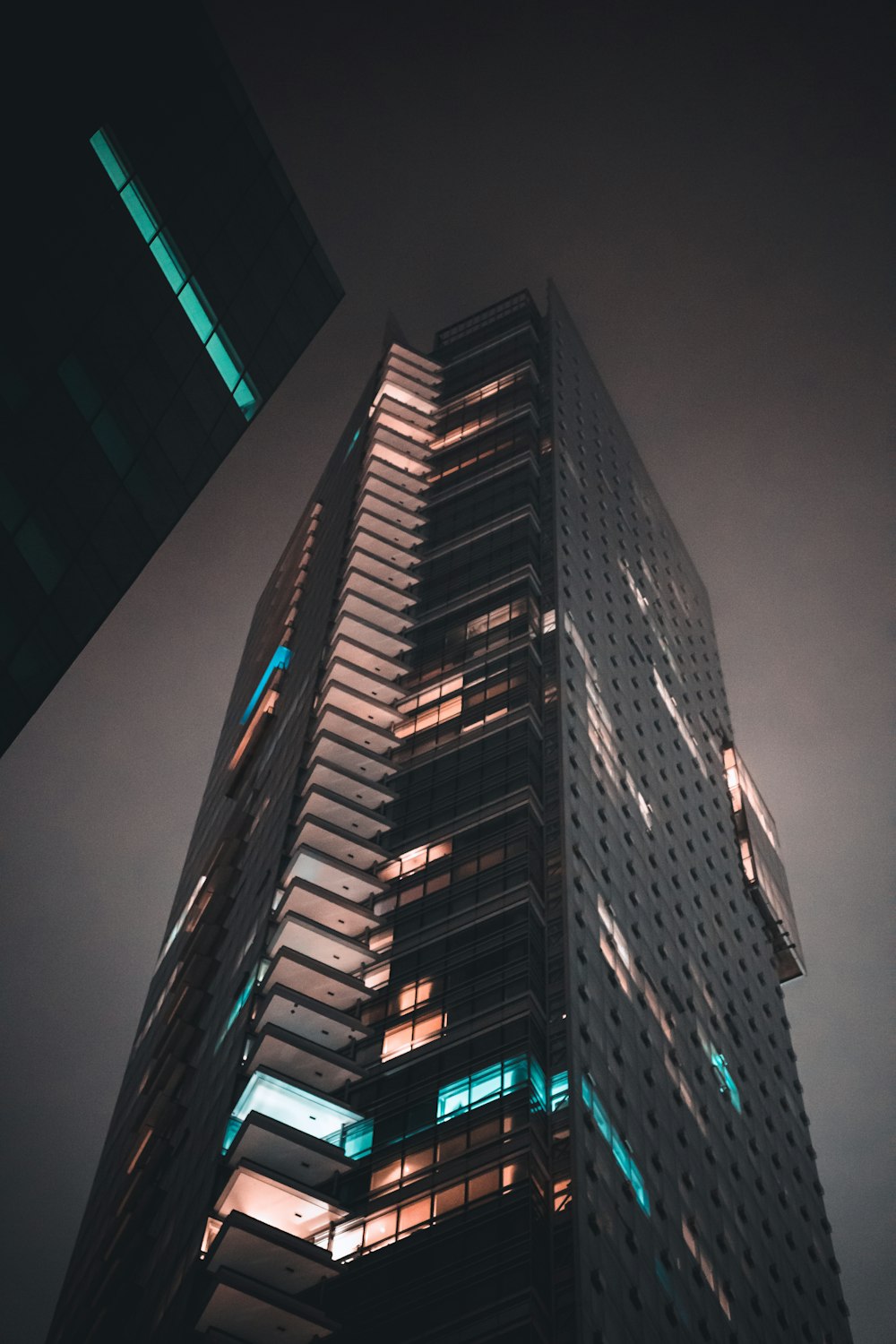 a traffic light is lit up at night