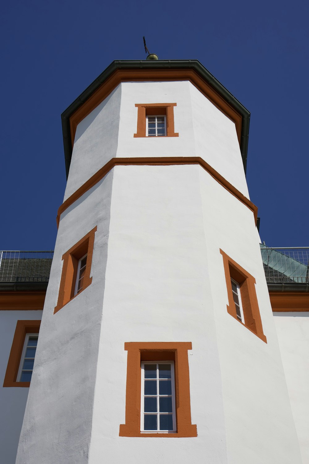 a white building with a tower