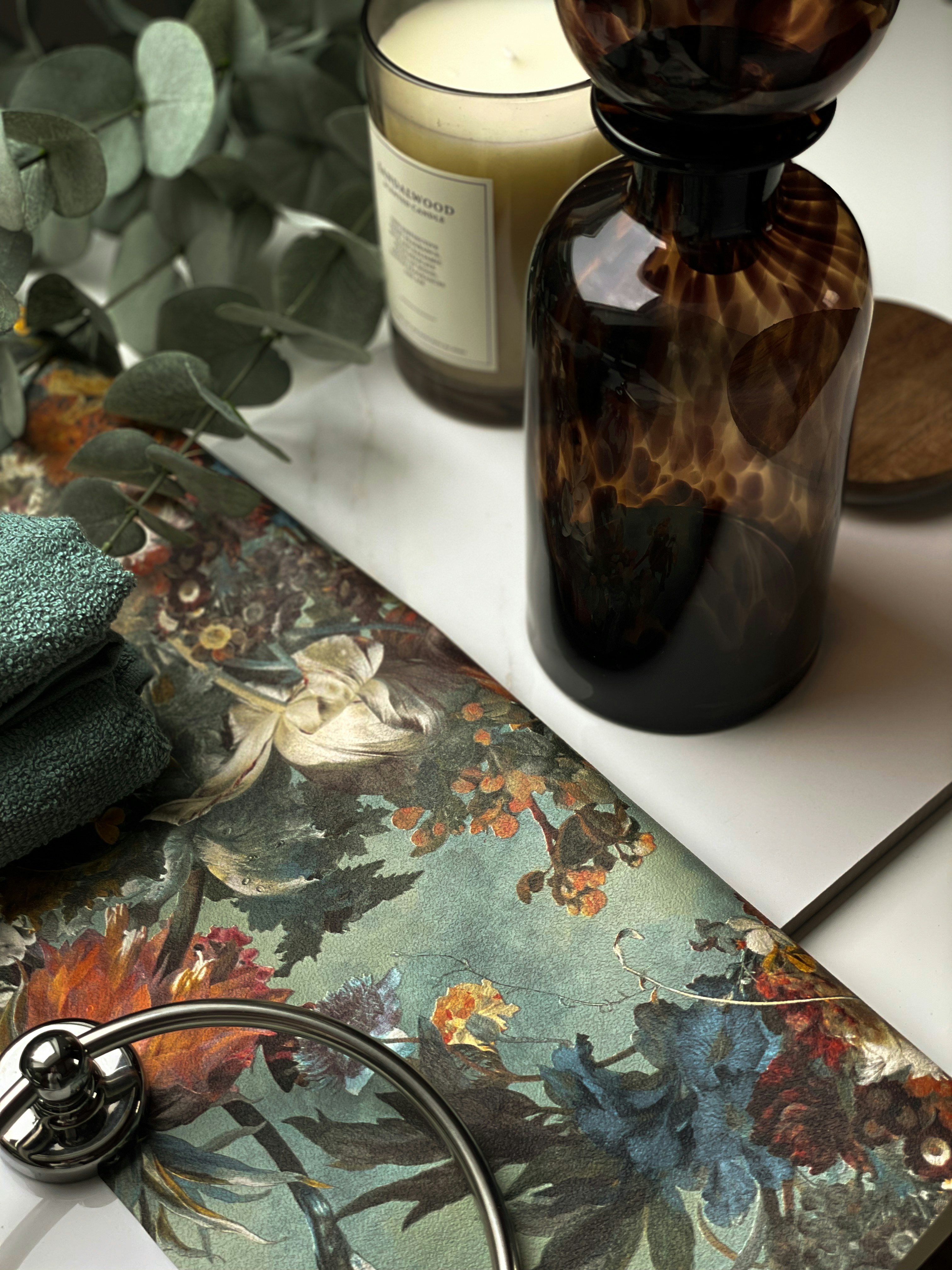 a vase with flowers on a table