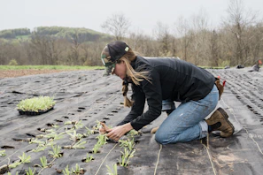 a man kneeling on the ground