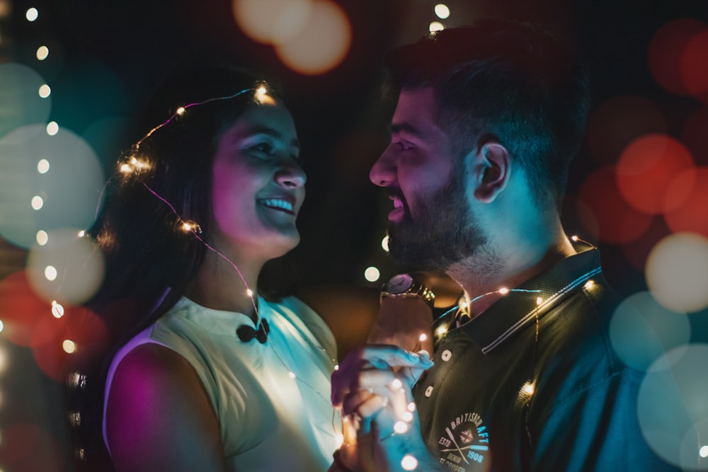 a man and woman singing into microphones