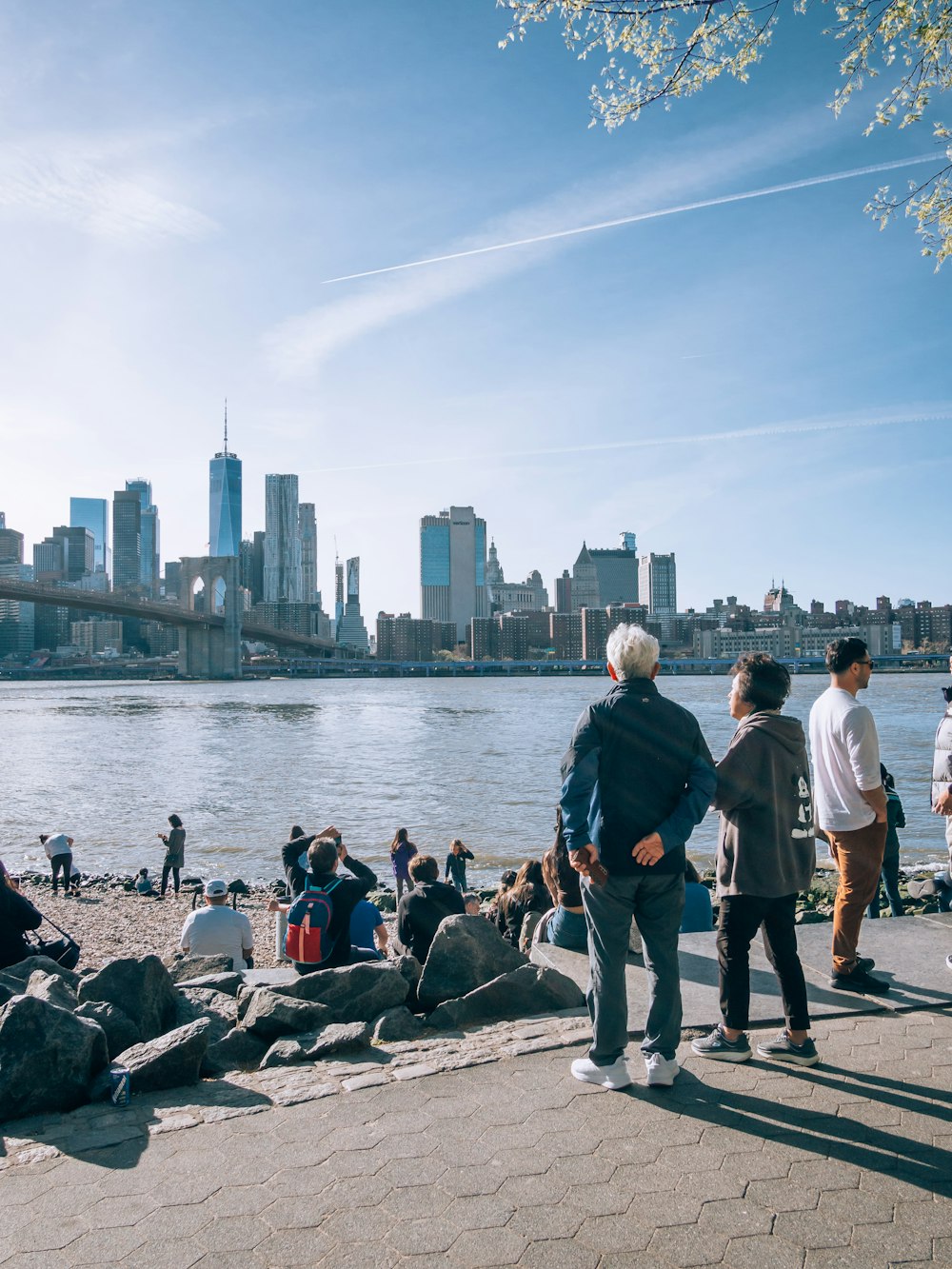 a group of people on a waterfront