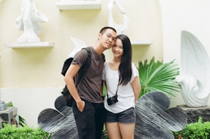 A beautiful portrait of a smiling couple in a natural setting.