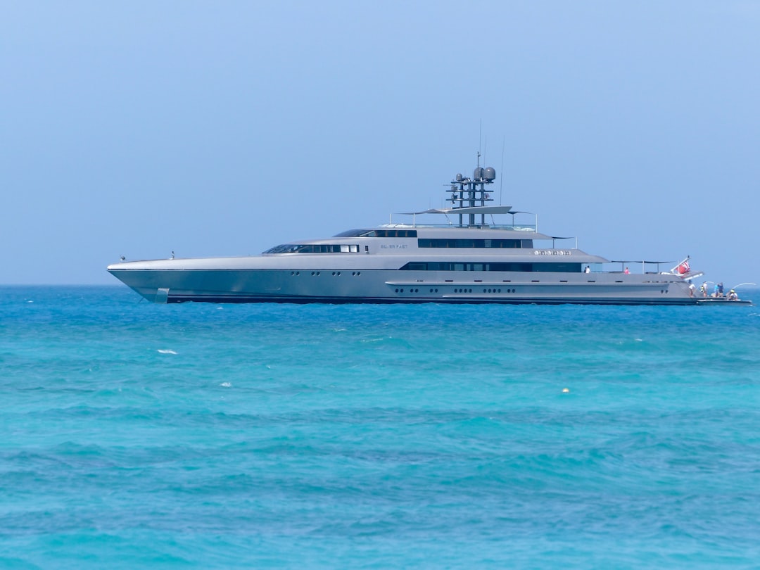 a large ship in the ocean, A yacht caught anchored in the Caribbean as the owners vacation in style