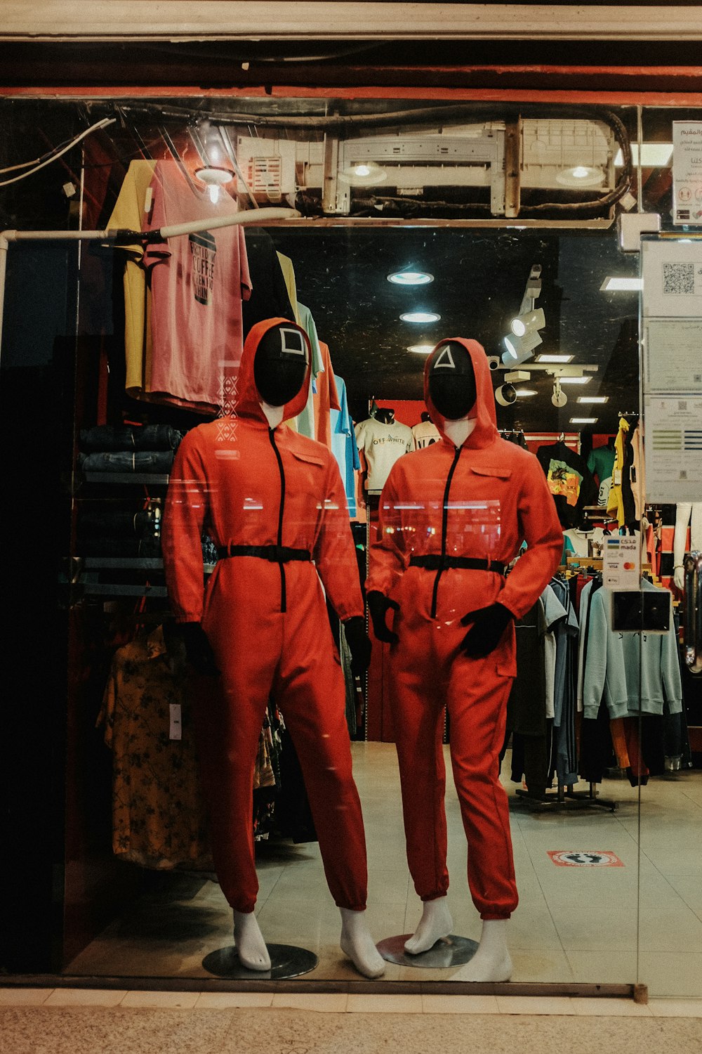 a couple of people in orange suits