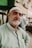 a man with a white headdress and a white turban