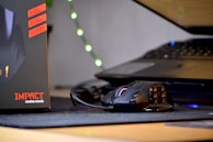 High-precision gaming mouse with customizable buttons on a mousepad.