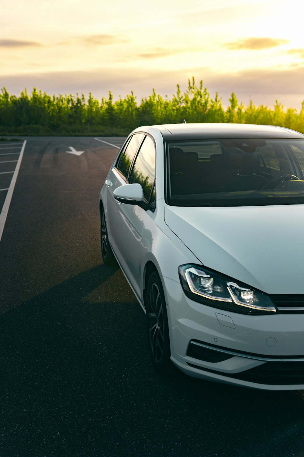 a white car parked on a road