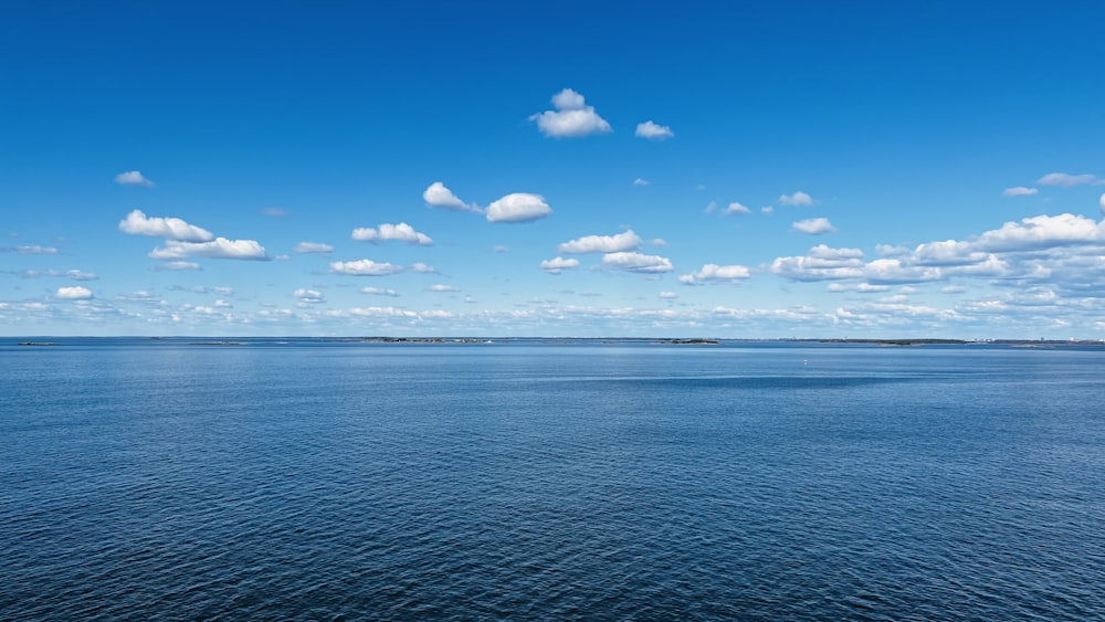 a body of water with a land in the distance