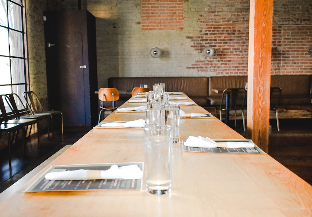 a table with empty glasses