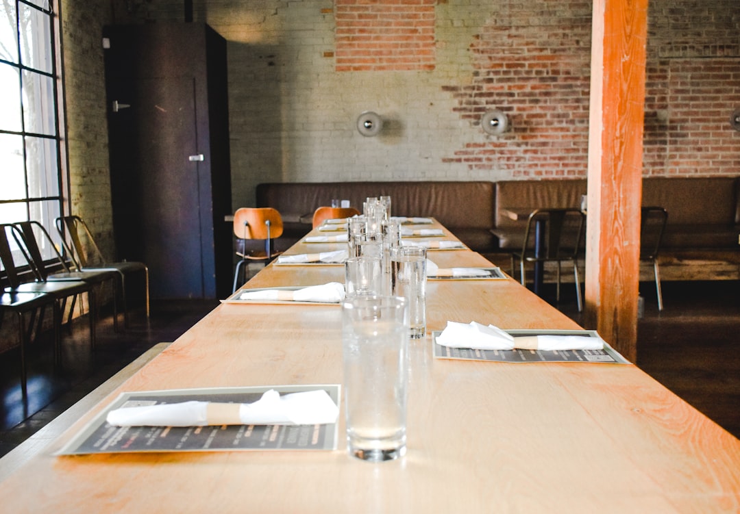 a table with empty glasses,