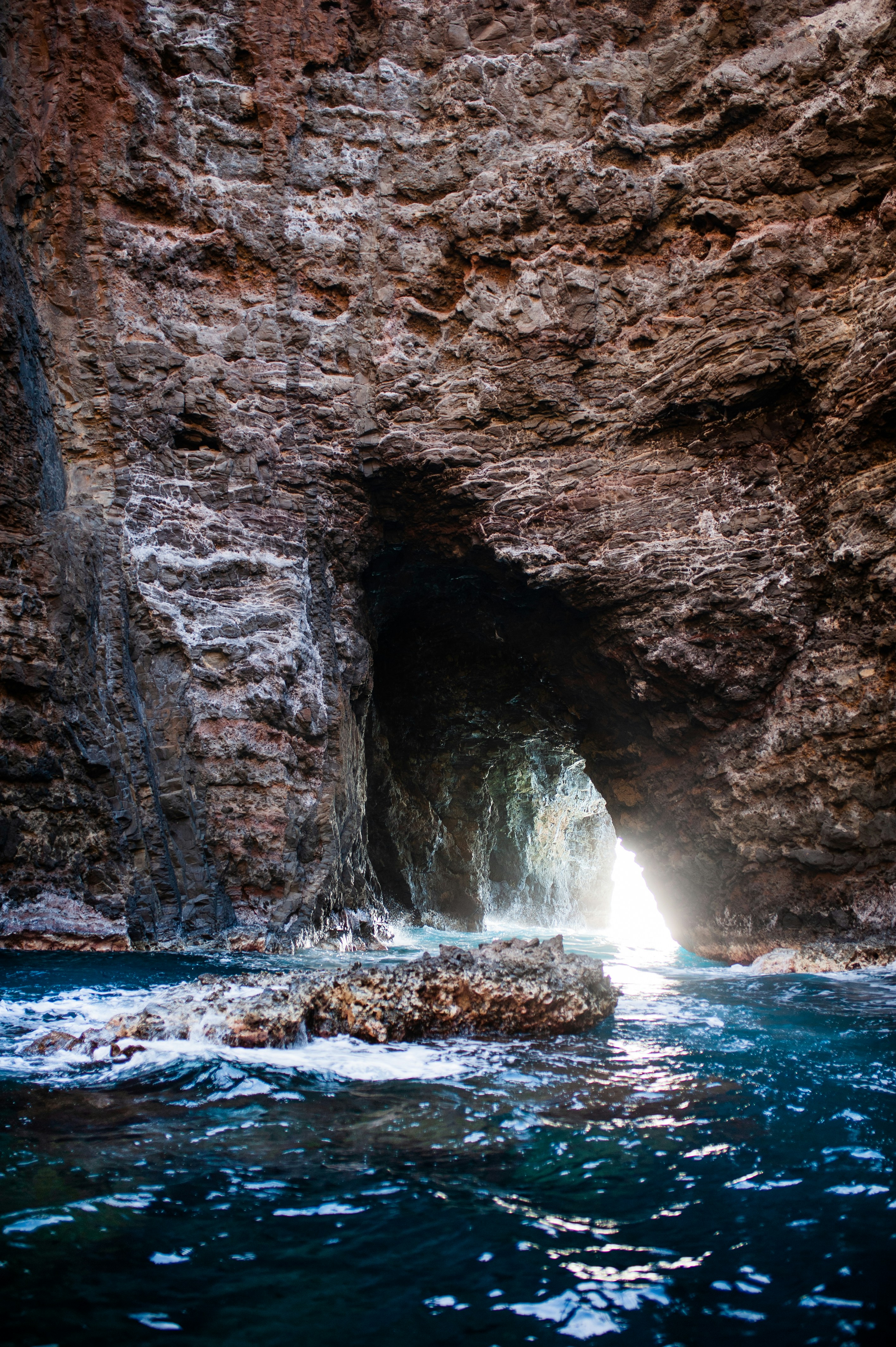 a cave with a body of water in it