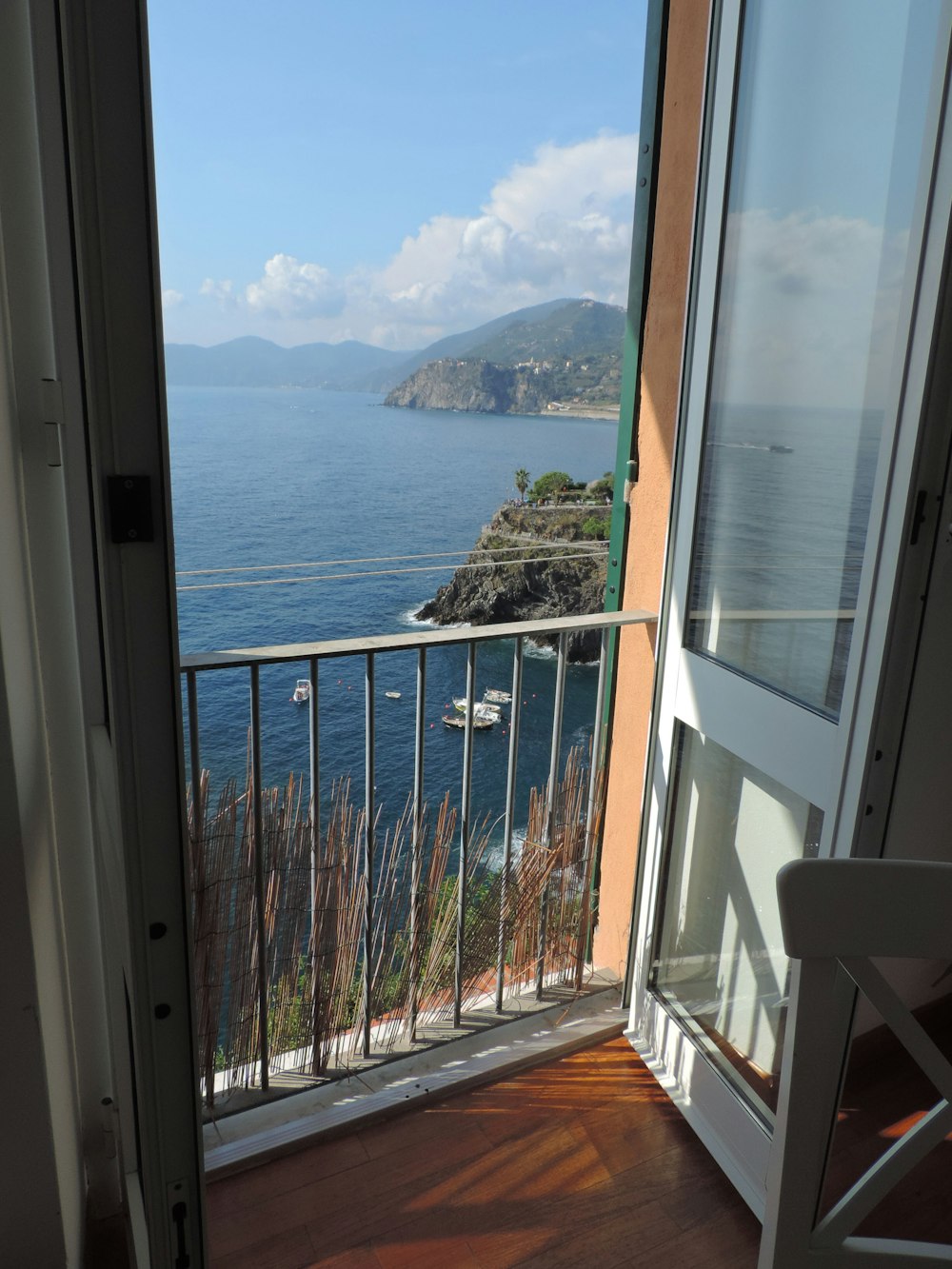 a view of the ocean from a balcony