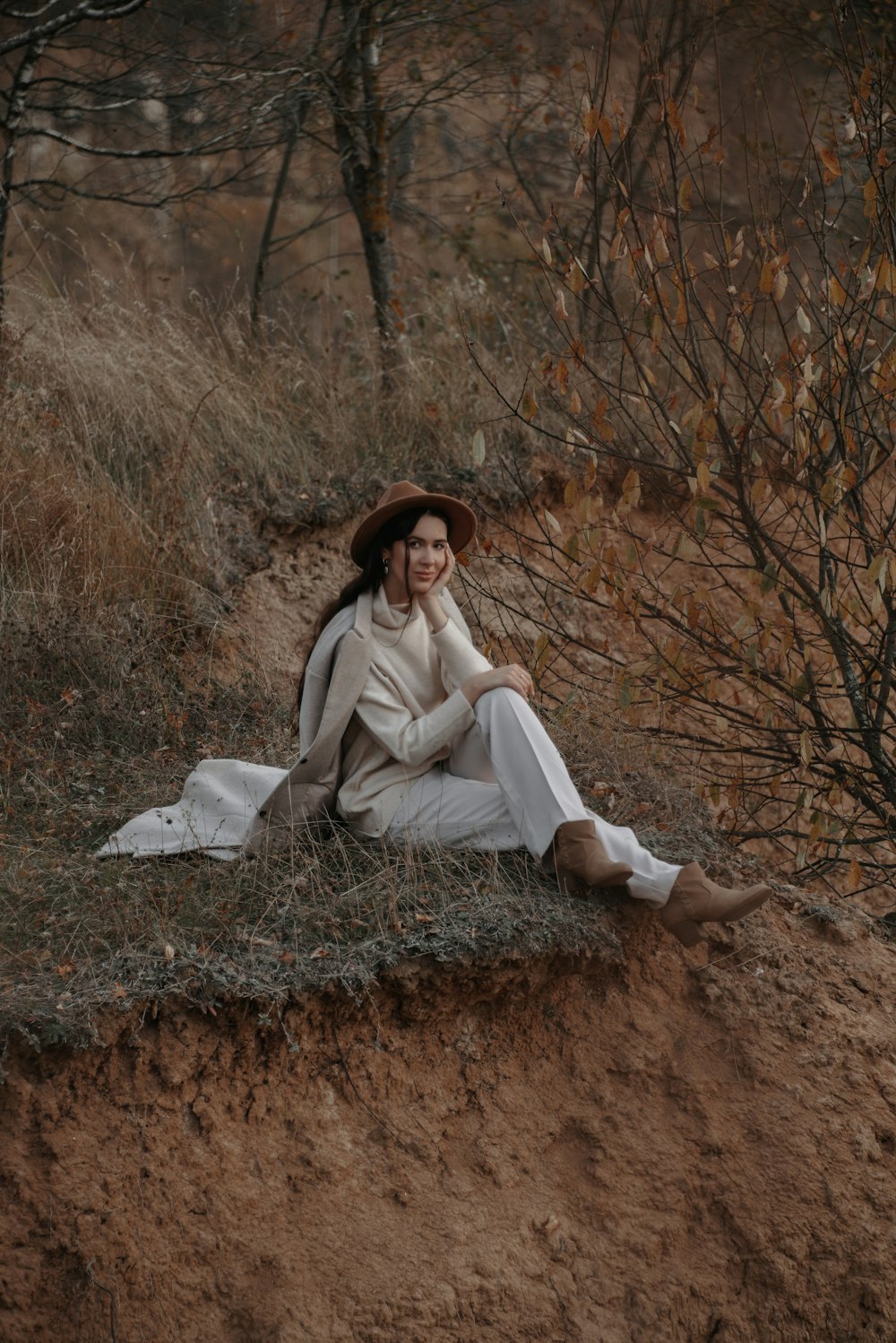 a person sitting in a field