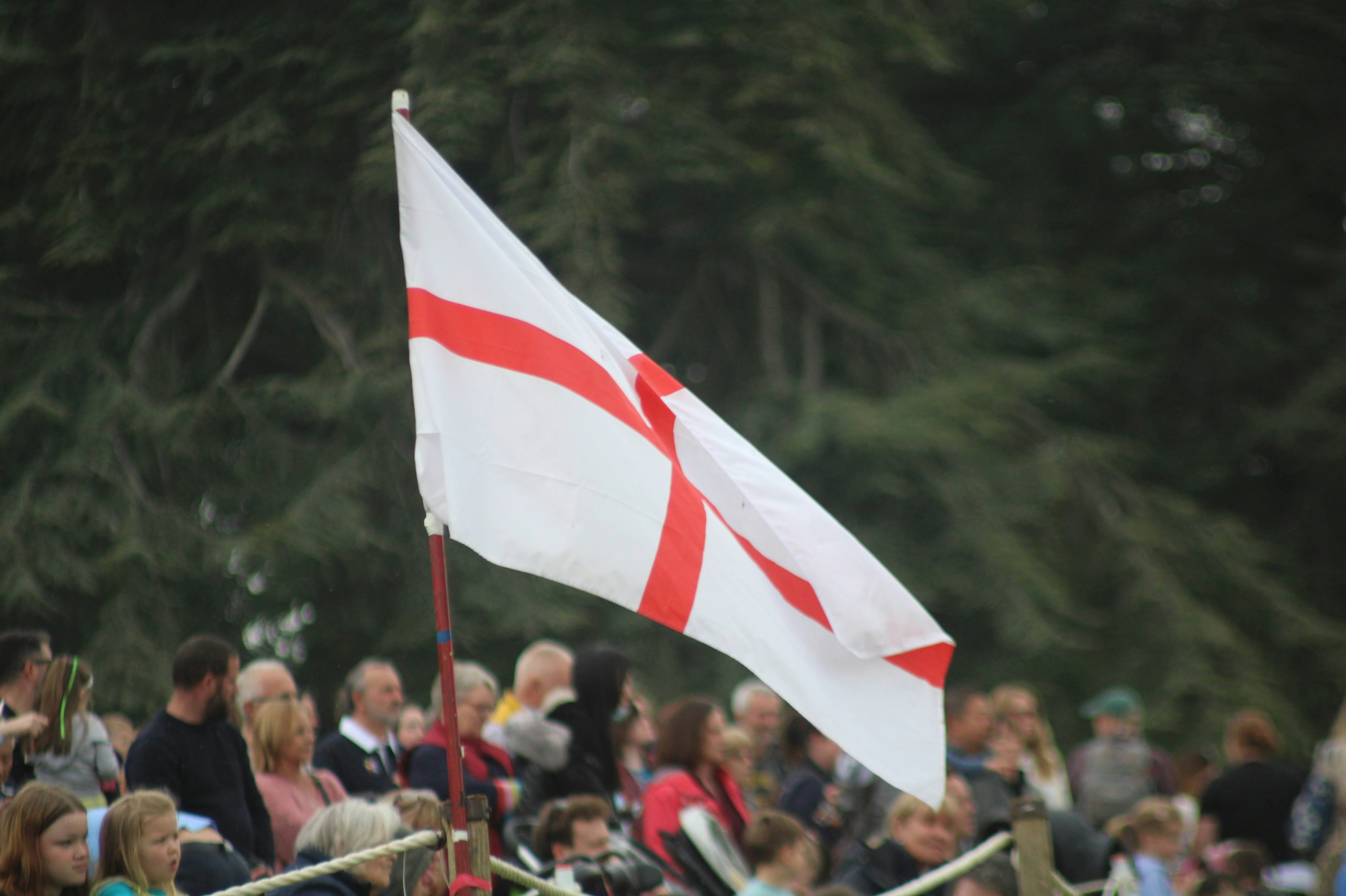 a group of people holding a flag