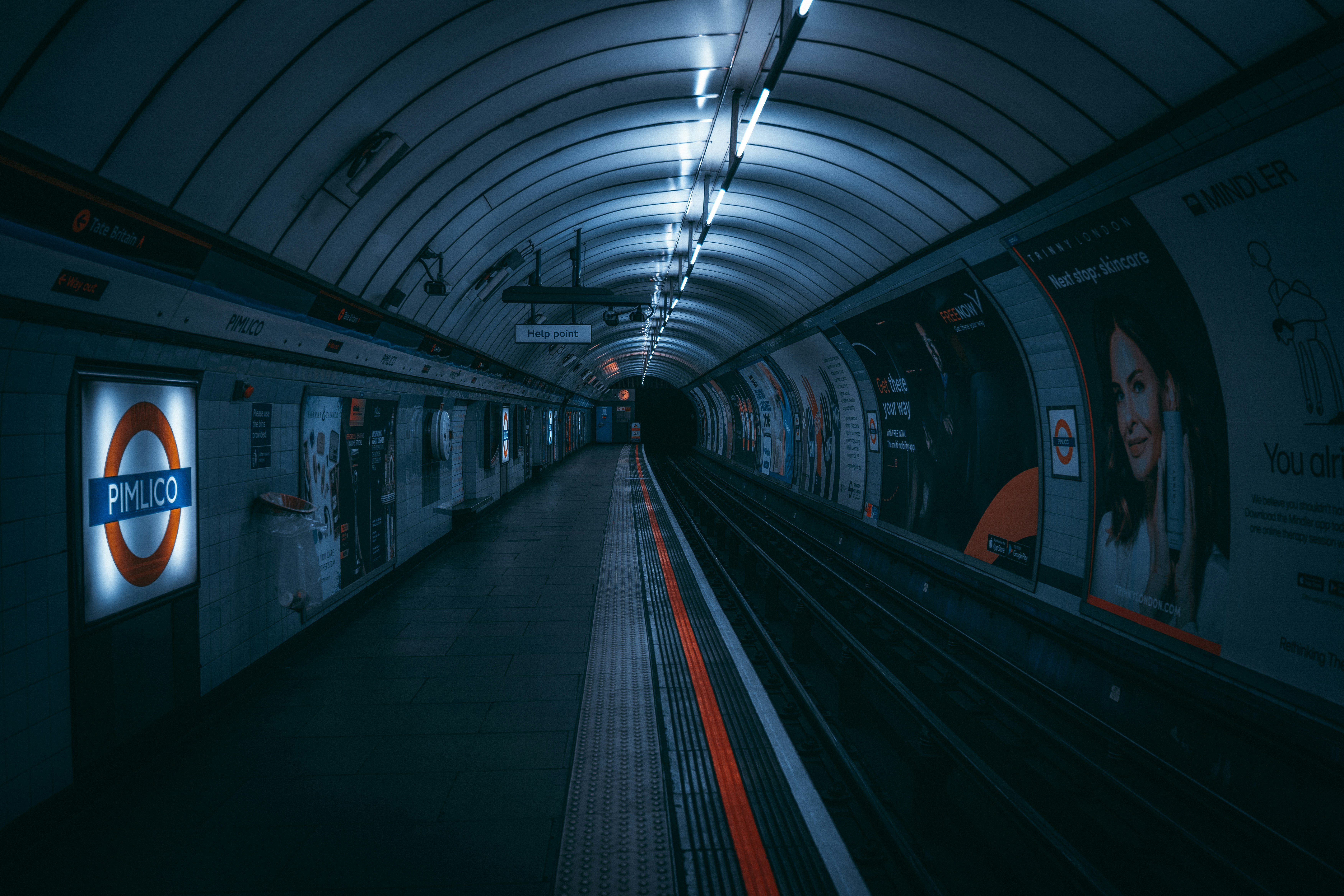 a subway station with a train