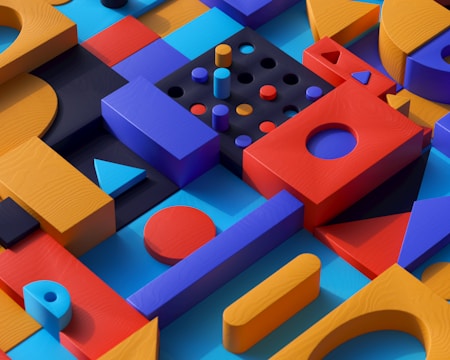 A geometric pattern featuring a variety of colorful 3D shapes arranged in a complex assembly. The design includes red, blue, orange, and black shapes, such as cubes, cylinders, triangles, circles, and rectangular prisms, all interlocked seamlessly. The vibrant colors and smooth textures give the arrangement a modern, abstract appearance.