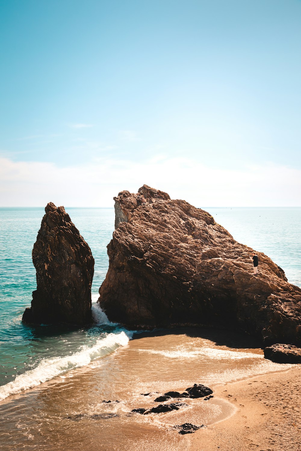 a large rock on a beach