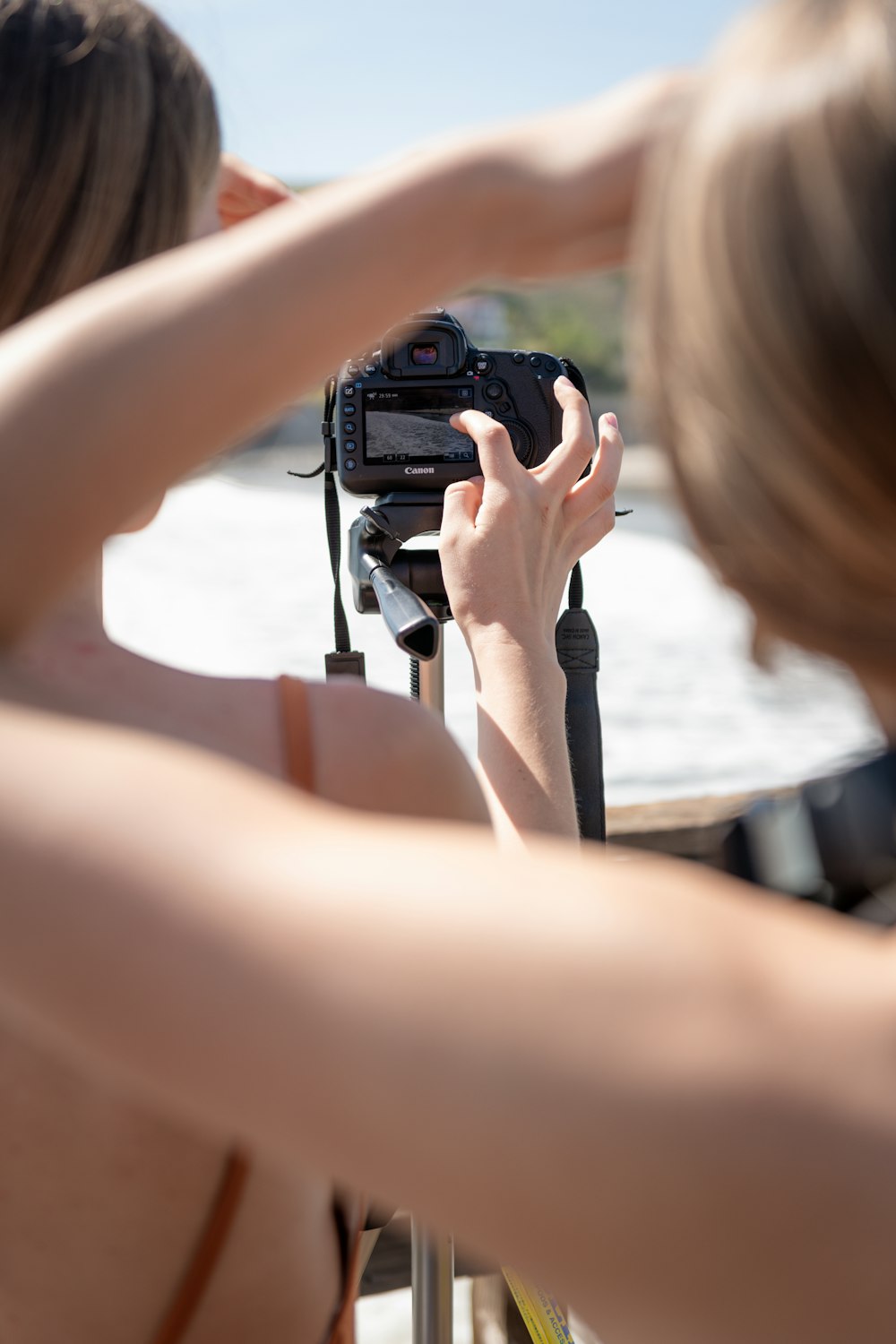 a woman holding a camera