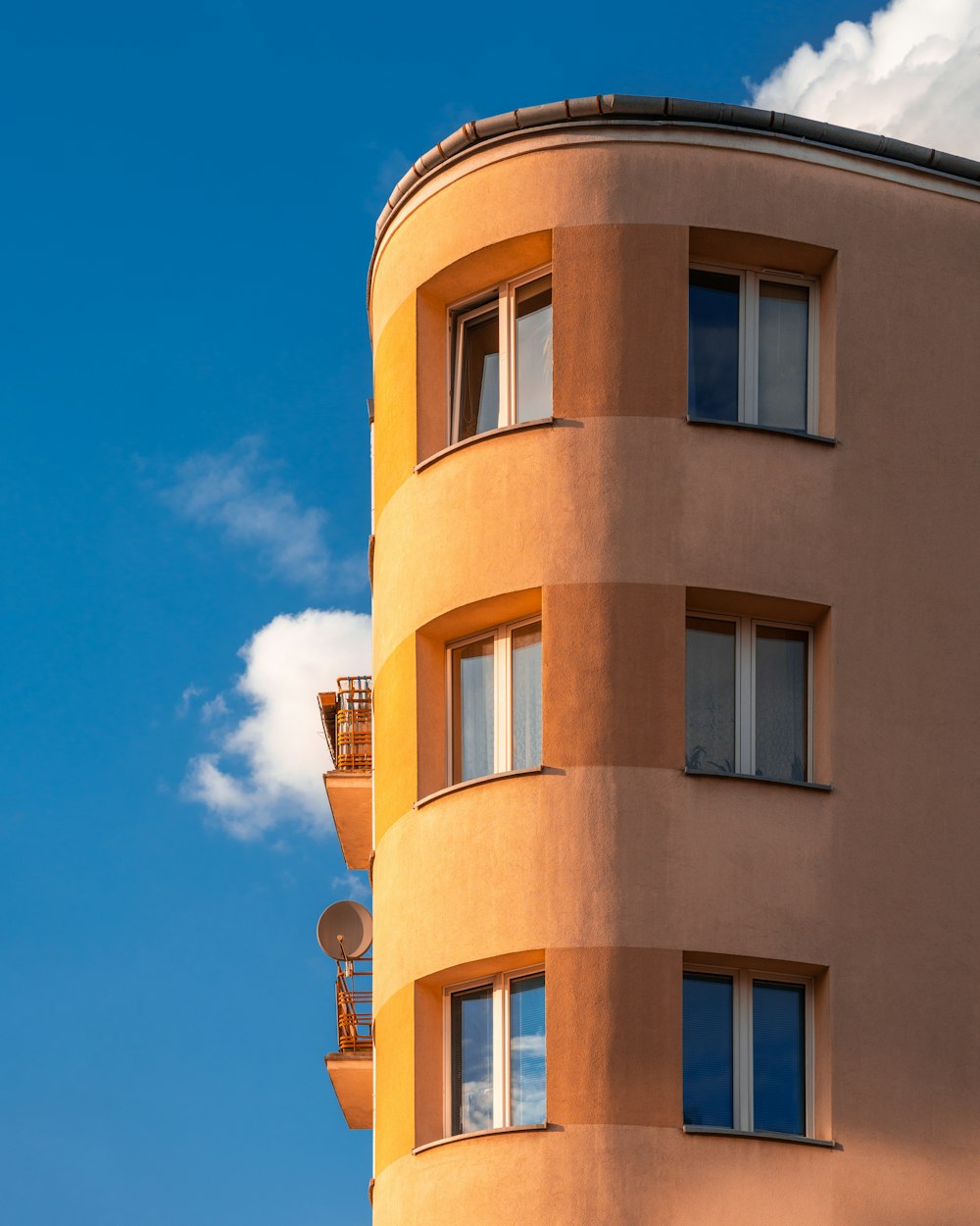 a tall building with a round top